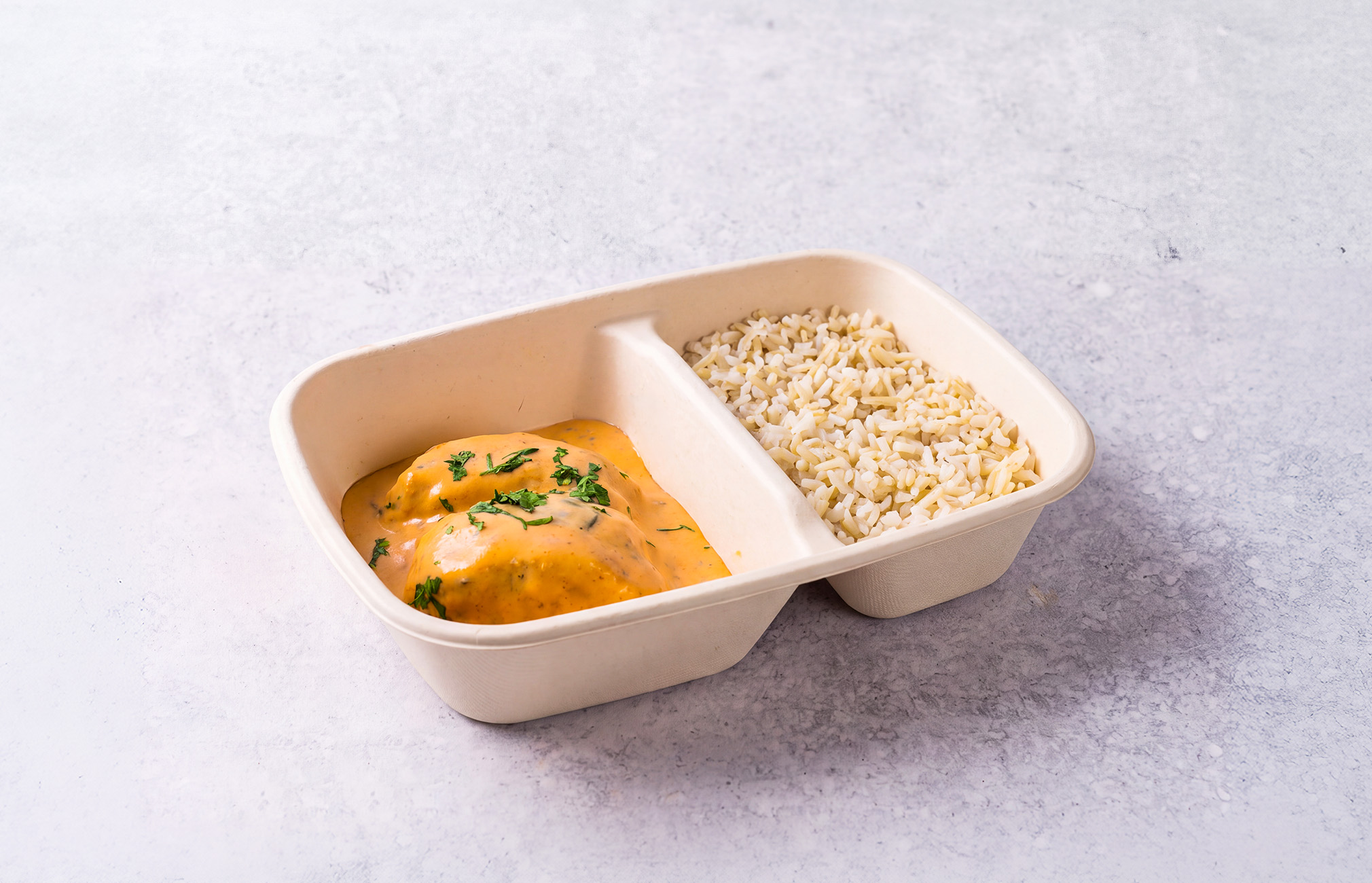 Salmon with creamy mustard sauce and spinach served with brown rice